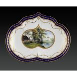 A CROWN DERBY DESSERT DISH, 1887 painted by Edwin Trowell with Crow Trees at Barrow on Trent, 27cm