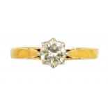 A DIAMOND SOLITAIRE RING with a round brilliant cut diamond of approx 0.3ct, in gold, marked