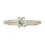 A DIAMOND SOLITAIRE RING the round brilliant cut diamond of approx 0.3ct, in gold, marked 750, 4.2g,