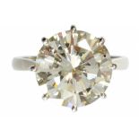 A DIAMOND SOLITAIRE RING the round brilliant cut diamond of approx 6.75ct, in platinum, marked PLAT,