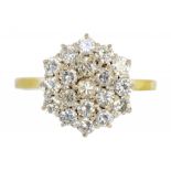 A DIAMOND CLUSTER RING in 18ct gold, Birmingham 1988, 3.8g, size Q ++Satisfactory second hand