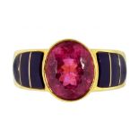 A PINK TOURMALINE RING in gold with blue enamel shoulders, maker's mark and 18K, 9g, size L ++