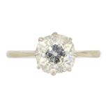 A DIAMOND SOLITAIRE RING with a cushion shaped old cut diamond, in platinum marked PLAT, 3.3g,