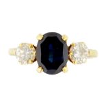 A SAPPHIRE AND DIAMOND THREE STONE RING in gold, marked 18ct, 3.3g, size M ++Satisfactory second