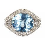 AN AQUAMARINE AND DIAMOND RING the oval aquamarine of 1 x 1.1cm approx, in 18ct white gold,