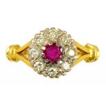 A RUBY AND DIAMOND CLUSTER RING in 18ct gold, London 1976, 4.6g, size P ++In satisfactory second