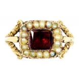 A GARNET AND SPLIT PEARL SQUARE CLUSTER RING, 19TH C in chased gold with split shoulders,