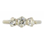 A DIAMOND THREE STONE RING with old cut diamonds, that to the centre of approx 0.3ct, in white gold,