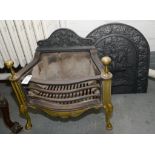 A BRASS AND CAST IRON FIRE GRATE AND CAST FIRE BACK, 61CM H