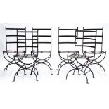 A SET OF SIX WROUGHT IRON GARDEN SEATS