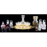 AN EPNS LIQUOR STAND WITH CONTEMPORARY CUT GLASS DECANTER AND STOPPER AND SIX GLASSES, STAND 29CM W,