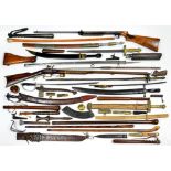 MISCELLANEOUS EDGED WEAPONS including a 19th century Indian steel tulwar, an imcomplete flintlock