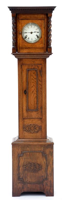 AN OAK DWARF LONGCASE CLOCK WITH ENAMEL DIAL AND SPRING DRIVEN MOVEMENT, C1920, 149CM H