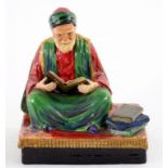 A STAFFORDSHIRE EARTHENWARE FIGURE OF THE TUNISIAN SCHOLAR OF LAW, 20 CM H, PAINTED TITLE AND BY