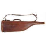 A LEATHER LEG-O'MUTTON SHOTGUN CASE AND SHOULDER STRAP