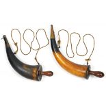 TWO CANNON POWDER HORNS, EARLY 19TH C with brass nozzle and spring lever, turned beech end and