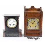 A GERMAN GOTHIC STYLE OAK MANTLE CLOCK, WITH SQUARE BRASS DIAL AND WINTERHALDER & HOFMEIER MOVEMENT,