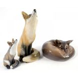 THREE ROYAL COPENHAGEN MODELS OF FOXES, LARGEST 27.5CM H, PRINTED AND PAINTED MARKS