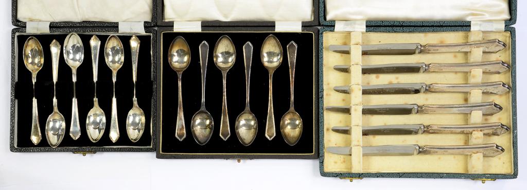 TWO CASED SETS OF SIX SILVER COFFEE SPOONS, BOTH SHEFFIELD, 1943 AND 1946 AND A CASED SET OF SIX