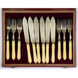 A SET OF SIX GEORGE V BONE HAFTED SILVER FISH KNIVES AND FORKS, SHEFFIELD 1931, CASED