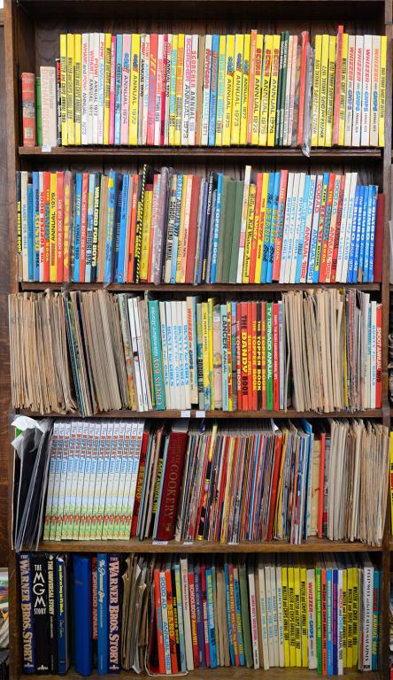 FIVE SHELVES OF CHILDREN'S ANNUALS AND COMICS, MOSTLY 1970'S AND 1980'S, INCLUDING DANDY, BEANO