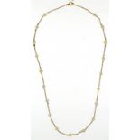 A GOLD NECKLACE WITH CULTURED PEARLS AT INTERVALS, MARKED 9C, 4.4G