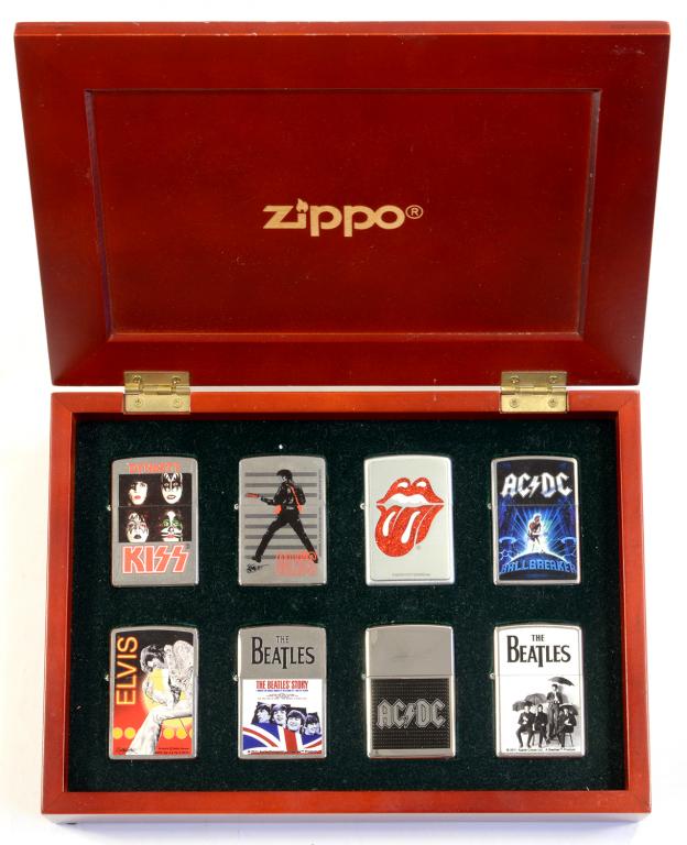 A BOXED SET OF SIX BEATLES, ELVIS AND OTHER COMMEMORATIVE ZIPPO LIGHTERS, BOX 24.5CM W