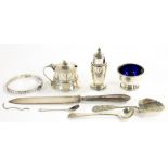 A GEORGE VI SILVER THREE PIECE CONDIMENT SET, BLUE GLASS LINERS, PEPPER CASTER 7CM H, BIRMINGHAM