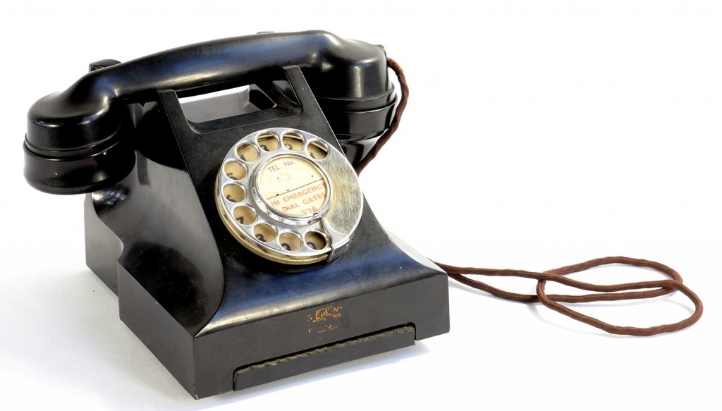 A SIEMENS BLACK BAKELITE DESK TELEPHONE