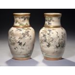 A PAIR OF JAPANESE SATSUMA VASES, MEIJI PERIOD painted with cranes in a continuous landscape of