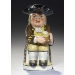 A NEALE & CO EARTHENWARE TOBY JUG, C1790 the traditional model but for a churchwarden pipe held
