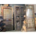 ELEVEN VICTORIAN OR EARLY 20TH C MAHOGANY AND OTHER DOORS including a pair of partly glazed doors