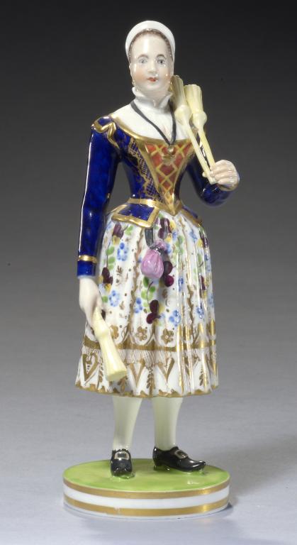 A DERBY FIGURE OF MADAME VESTRIS AS A BROOM SELLER, C1825 modelled by Samuel Keys, richly decorated,