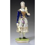 A DERBY FIGURE OF MADAME VESTRIS AS A BROOM SELLER, C1825 modelled by Samuel Keys, richly decorated,