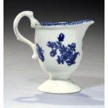 A LIVERPOOL BLUE AND WHITE HELMET SHAPED MILK JUG, JOHN OR JANE PENNINGTON, C1785-95 with biting