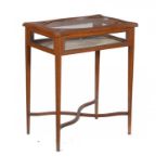AN EDWARD VII SERPENTINE SATINWOOD AND LINE INLAID DISPLAY TABLE, C1905 76cm h; 42 x 62cm ++Some