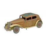 A WELLS TOY CLOCKWORK TINPLATE SEDAN, C1930 lithographed in red, buff, green and yellow with sliding