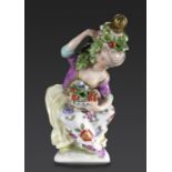 A SAMSON PORCELAIN FIGURAL SCENT BOTTLE, LATE 19TH C in the form of a young woman gathering fruit,