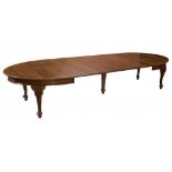 AN EDWARD VII OAK EXTENDING DINING TABLE, C1910 on carved cabriole legs, 76cm h; 137 x 329cm ++