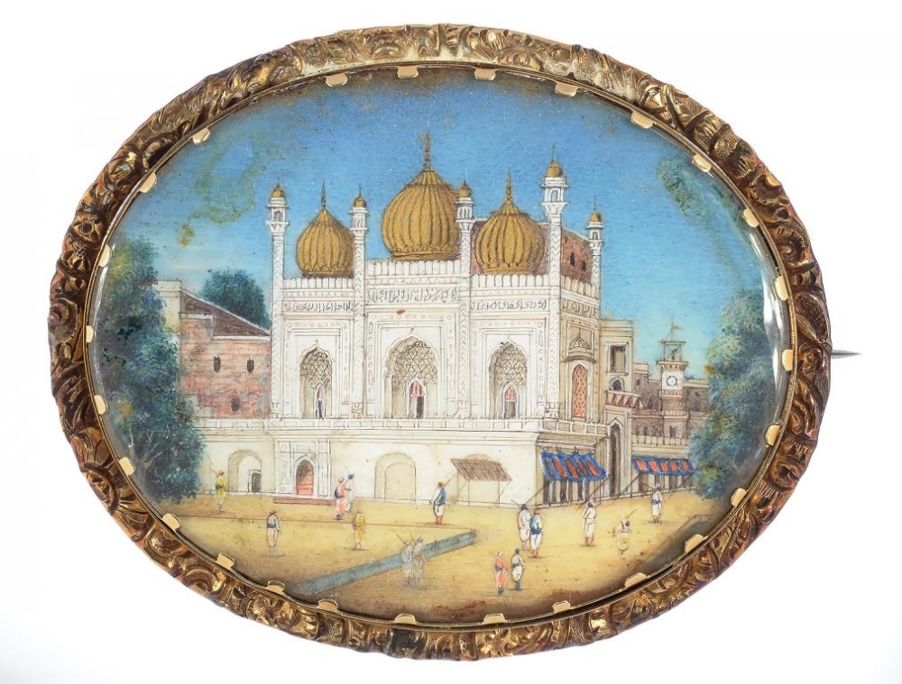 A VICTORIAN GOLD BROOCH, SET WITH A DELHI SCHOOL MINIATURE, THE REVERSE WITH HAIR UNDER (DAMAGED)