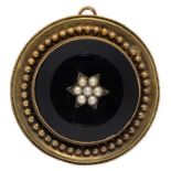 A GOLD, BLACK ONYX AND SPLIT PEARL PENDANT, WITH BEADED SURROUND AND LOCKET BACK, LATE 19TH C