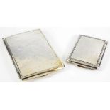 A FOREIGN SILVER CIGARETTE CASE, HAMMER TEXTURED AND A SIMILAR LADY'S CIGARETTE CASE, CONTROL MARKS,