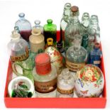 A QUANTITY OF VICTORIAN AND LATER GLASS JARS AND BOTTLES, TWO PAPERWEIGHTS AND A CHINESE ENAMELLED