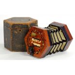 A VICTORIAN CONCERTINA, WITH PRINTED TRADE LABEL LACHENAL & CO PATENT CONCERTINA MANUFACTURER LONDON