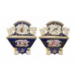 A PAIR OF COALPORT CARD RACKS, C1820 painted with gilt cartouche shaped panels of birds and