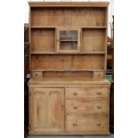 A VICTORIAN WAXED PINE DRESSER AND RACK WITH A SEPARATE STAINED PINE SHELF 195 X 123CM