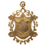 A PIERCED 9CT GOLD WATCH FOB SHIELD, BIRMINGHAM 1901, 8.4G