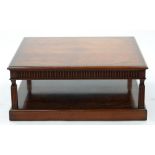 A FIGURED MAHOGANY COFFEE TABLE, WITH SQUARE TOP AND PLINTH, 101CM X 101CM