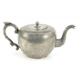 A CHINESE ENGRAVED PEWTER GLOBULAR TEAPOT AND COVER 11.5cm h, stamped WONG TAI STORE KEEPER and