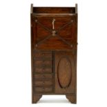 AN OAK WRITING CABINET, 111CM H AND 50CM W